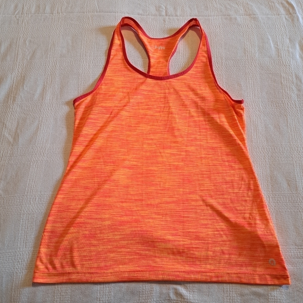Hyba women's size medium racer back tank, orange with red trim